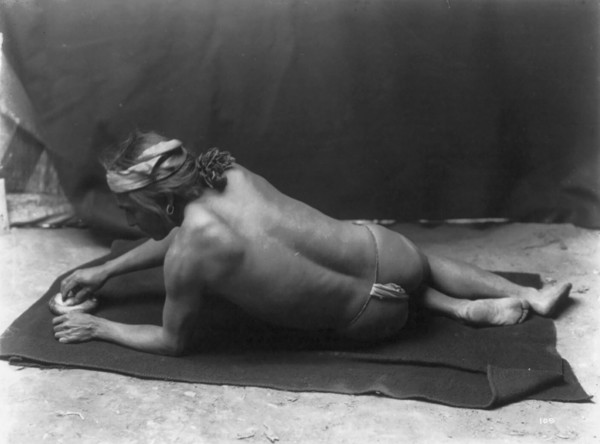 Grinding medicine-Zuni, c1903. Creator: Edward Sheriff Curtis.