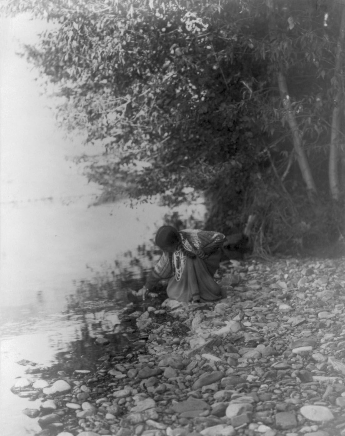 By the river-Flathead, c1910. Creator: Edward Sheriff Curtis.
