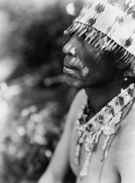 Coast Pomo with feather head-dress, c1924. Creator: Edward Sheriff Curtis.