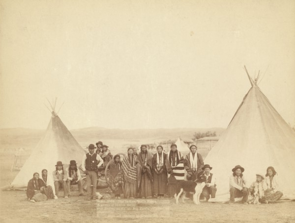 The Indian Girl's Home A group of Indian girls and Indian police at Big Foot's village..., 1890. Creator: John C. H. Grabill.