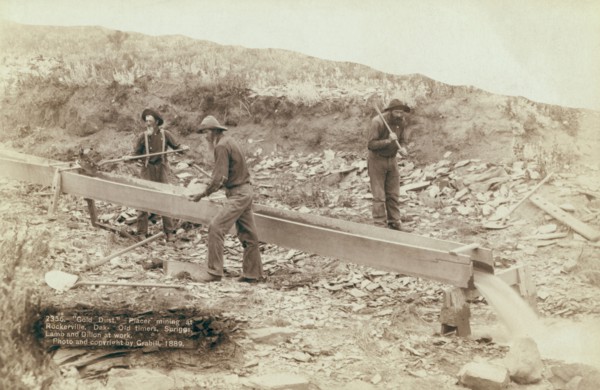 Gold Dust Placer mining at Rockerville, Dak Old timers, Spriggs, Lamb and Dillon at work, 1889. Creator: John C. H. Grabill.