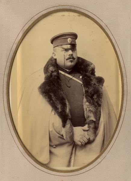 Firefighter A.F. Domishkevich in uniform, late 19th cent - early 20th cent. Creator: PA Milevskii.
