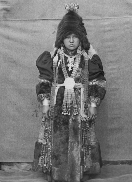 Yakut woman in festive attire, 1890. Creator: Unknown.