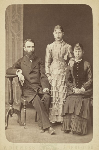 Family portrait of an unidentified man and his two daughters, 1885. Creator: Unknown.
