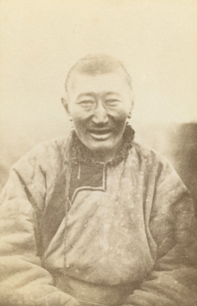 Half-length portrait of man, seated, facing front, between 1870 and 1886. Creator: Unknown.