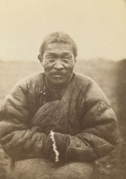 Half-length portrait of man, seated, facing front, between 1870 and 1886. Creator: Unknown.