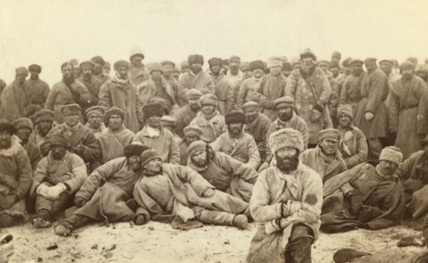 Group portrait of large group of convicts, between 1880 and 1886. Creator: Unknown.