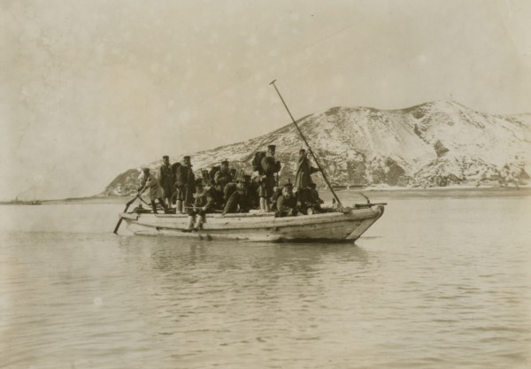 Squad of sappers and miners coming ashore in a sampan at Chemulpo, c1904. Creator: Robert Lee Dunn.