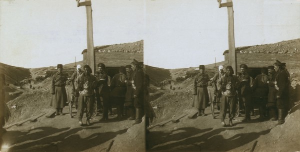 Carrying wounded Russian in a jinriksha from the front down to the hospital in Port Arthur, c1905. Creator: Underwood & Underwood.