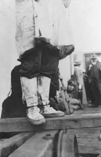 On a dock in Nome, between c1900 and 1916. Creator: Unknown.