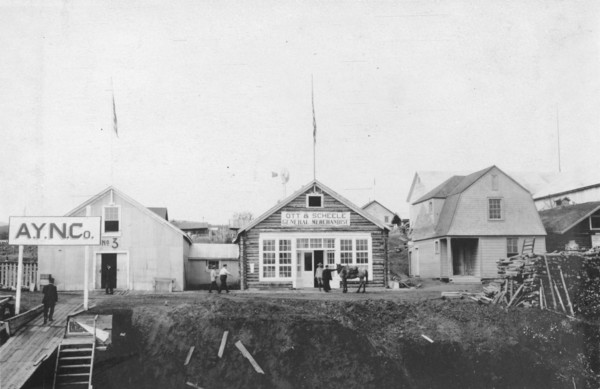 Scene in front of Ott and Scheele's general merchandise store, between c1900 and 1916. Creator: Unknown.