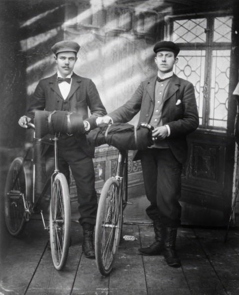 Cyclists in the studio; two men with bicycles, 1890-1910. Creator: Lars Olsson Akerman.