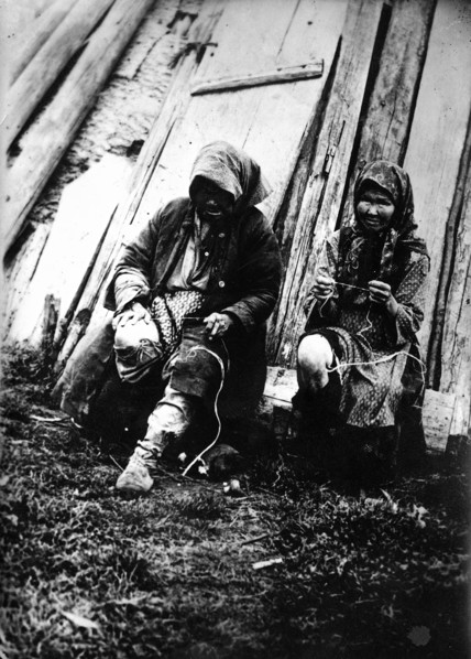 Tutur Tungus. Dudovka camp. Old women twist threads from deer tendons, 1920-1939. Creator: Unknown.