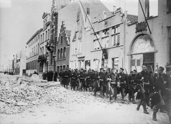 Belgians re-enter Termonde, between c1914 and c1915. Creator: Bain News Service.