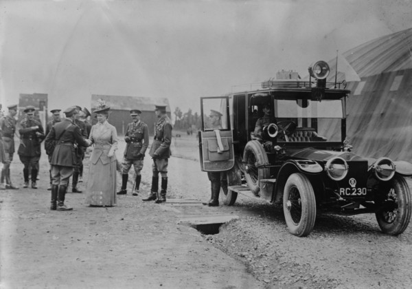 Queen Mary visits aerodrome shed, 5 Jul 1917. Creator: Bain News Service.