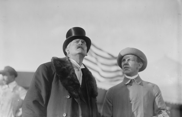 W. Wellman with unidentified gentleman at aviation meet, 1910. Creator: Bain News Service.