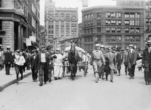 D.H. Woolf and wife arriving in N.Y.C., 1910. Creator: Bain News Service.