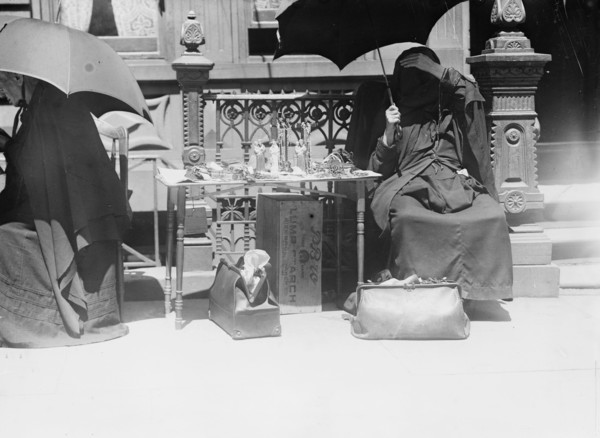 Outside church of St. Jean Baptiste, selling beads, etc., between c1910 and c1915. Creator: Bain News Service.