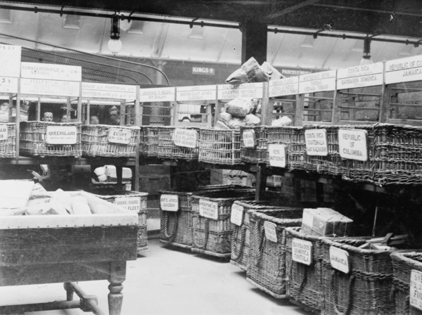 British Parcels Post-sorting parcels for foreign mail, between c1910 and c1915. Creator: Bain News Service.