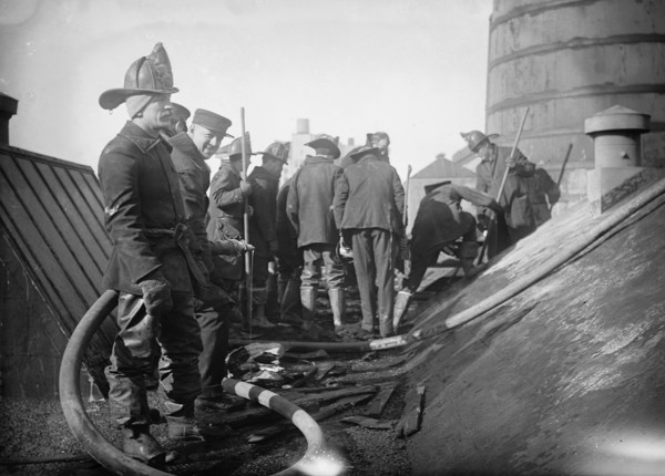 Putting out fire in Bain News Service Bldg. 1/6/12, 1912. Creator: Bain News Service.