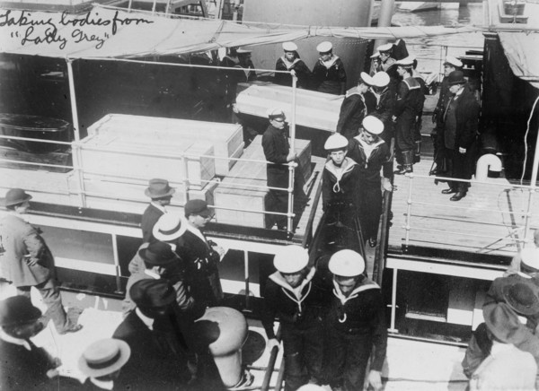 Taking bodies from LADY GREY, 1914. Creator: Bain News Service.