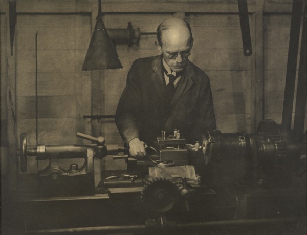 Untitled (Industry; man working lathe), 1920s. Creator: AJ Wales.