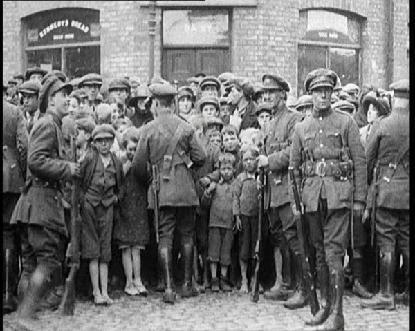 Soldiers Holding Back Children in Dublin, 1922. Creator: British Pathe Ltd.