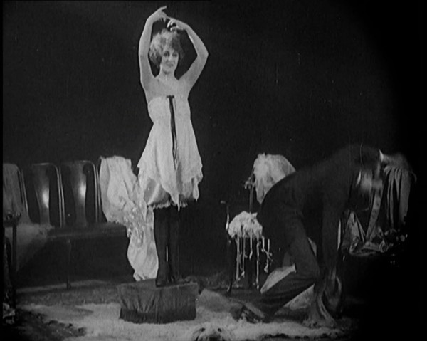 Alphonse Berge, Famous Fashion Designer,  Constructing a Dress, a Female Civilian Model..., 1920. Creator: British Pathe Ltd.