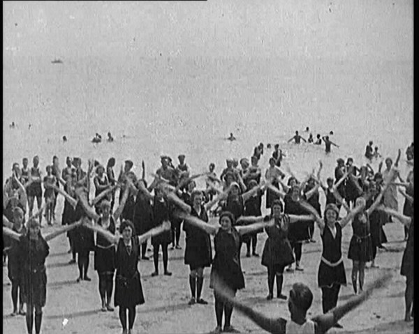 A Group of Female Civilians Exercising on a Beach, 1920. Creator: British Pathe Ltd.