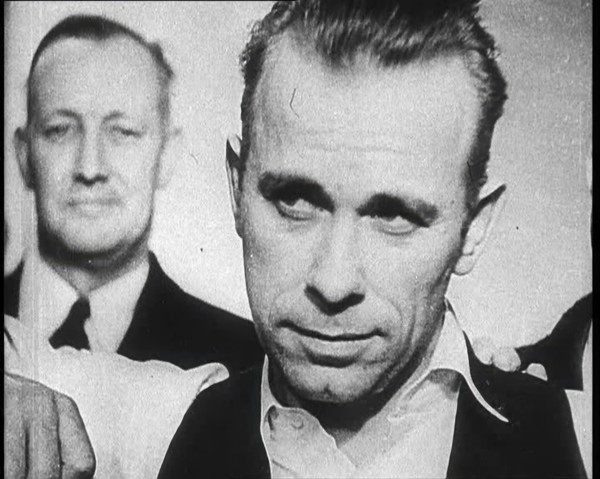 American Gangster John Herbert Dillinger Behind Bars, 1930s. Creator: British Pathe Ltd.