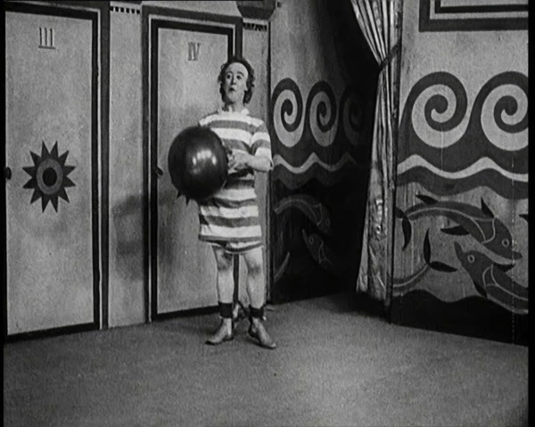 Stanley Lupino Performing in a Show in London Wearing a Stripy Bathing Suit, 1922. Creator: British Pathe Ltd.