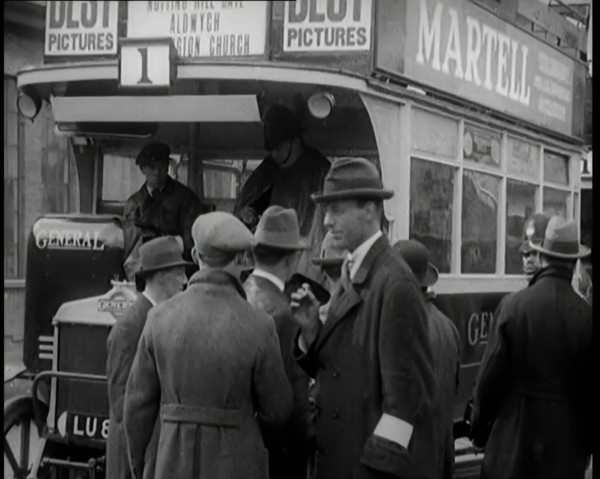 Volunteer Male Civilian Driving a Tram With a Police Escort Sitting Beside Him, 1926. Creator: British Pathe Ltd.