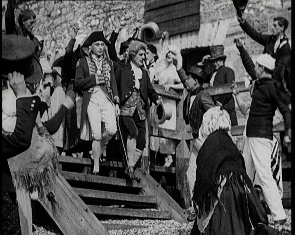 Scene from the Feature Film 'Nelson': Crowds of Actors in Period Costume Lining the..., 1920s. Creator: British Pathe Ltd.