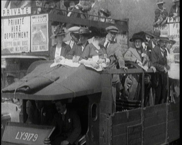 Cars, Buses and Pedestrians Arriving for the 1920 Epsom Derby, 1920. Creator: British Pathe Ltd.