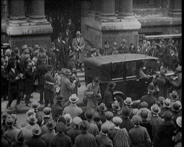 People Gathering and Coming and Going Outside the Carlton Club in London, 1922. Creator: British Pathe Ltd.
