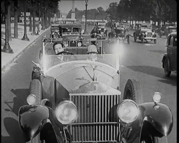 Scene from the Film 'The Compulsory Husband': The Actor Monty Banks Driving a Car With..., 1920s. Creator: British Pathe Ltd.