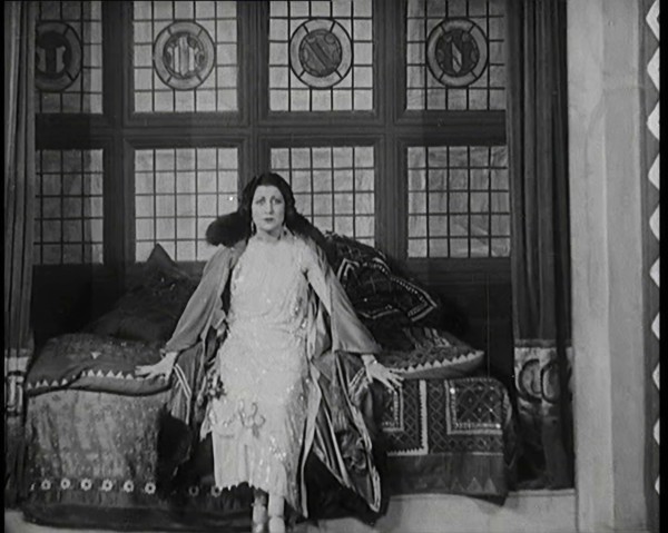 The Female Actor Josie Collins Performing in  a Play With Two Male Actors, 1920s. Creator: British Pathe Ltd.