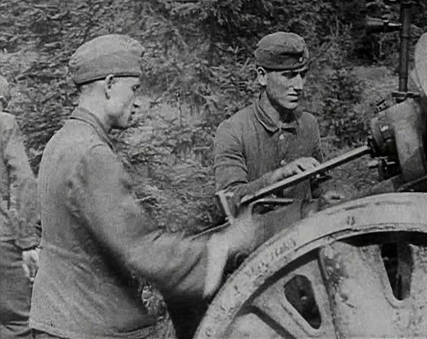 German Soldiers Operating an Artillery Gun, 1941. Creator: British Pathe Ltd.