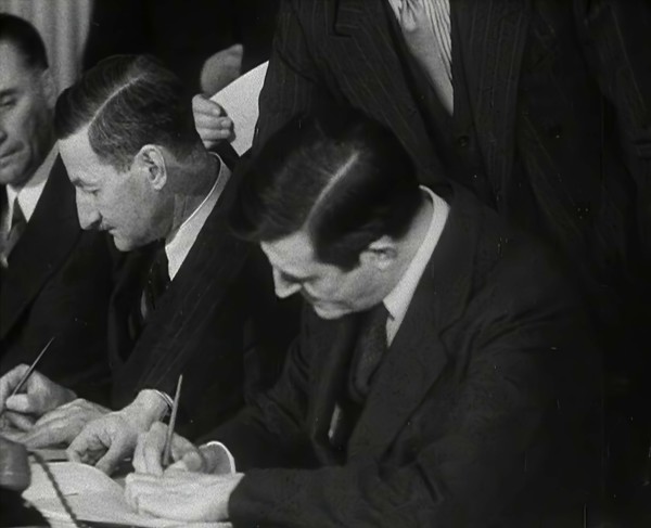 Wendell Willkie Signing an Agreement Allowing the USA to use British Naval Bases..., 1941. Creator: British Pathe Ltd.