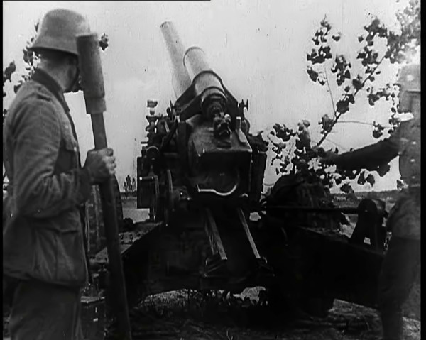 Two Male German Soldiers by an Artillery Gun, 1939. Creator: British Pathe Ltd.