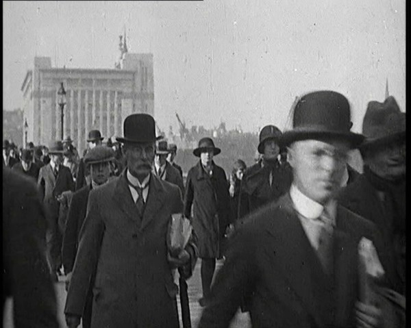 Pedestrians And Commuters Crossing London Bridge, 1920s. Creator: British Pathe Ltd.