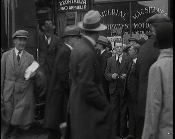Civilians Disembarking from a Bus On the Streets of London, 1920s. Creator: British Pathe Ltd.