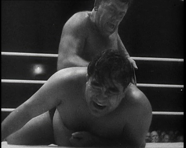 Spectators Watching a Wrestling Match, 1930s. Creator: British Pathe Ltd.