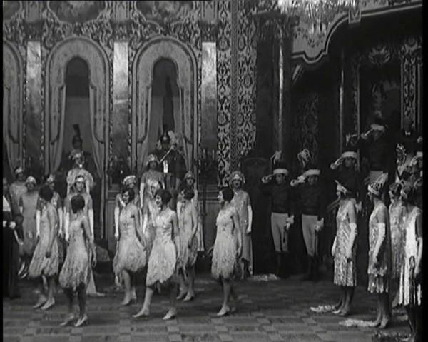 Scene from the Musical Princess Charming: a Group of Actors Dancing As the Actor Playing..., 1920s. Creator: British Pathe Ltd.