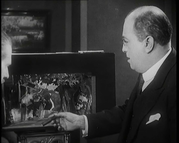 The Producer Julian Wylie Choosing Set a Design for a Theatre Show, 1920s. Creator: British Pathe Ltd.