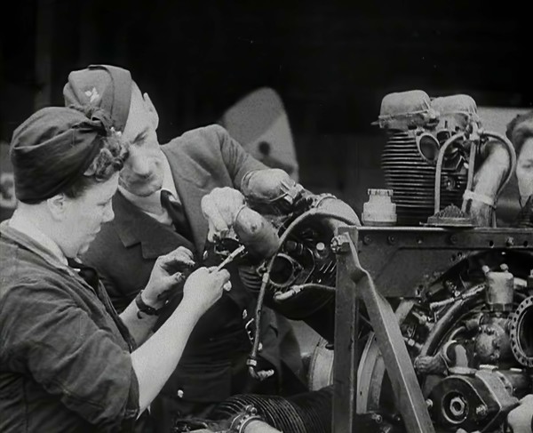 Woman Working on an Aeroplane Engine, 1942. Creator: British Pathe Ltd.