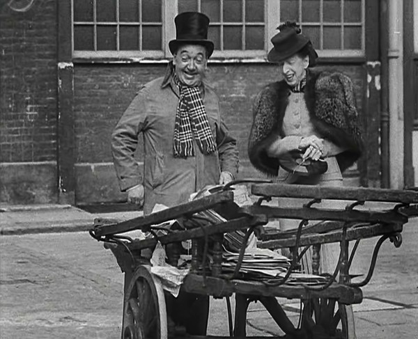 Syd Walker Talking to Nellie Wallace About Using gramophone records for War Materials, 1942. Creator: British Pathe Ltd.