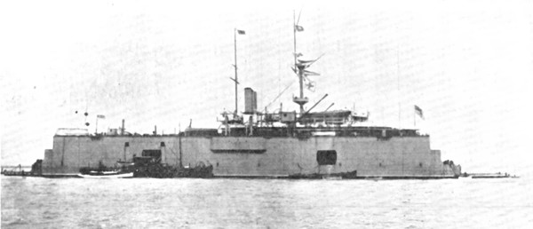 A battle-ship docked on the water: H.M.S. "Sans Pareil" on a floating-dock in the Tyne, 1909. Creator: L.N.A..