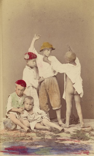 Five Italian street boys: two seated, three standing, 1865-1875. Creator: Arena & D'Alessandri.