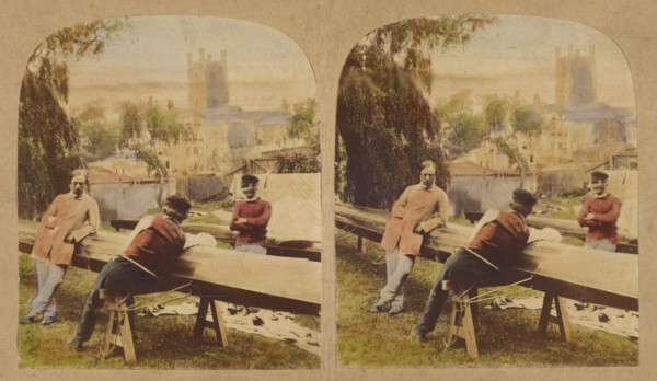 Three men at a table outside, castle in background, 1857-1862. Creator: Roger Fenton.